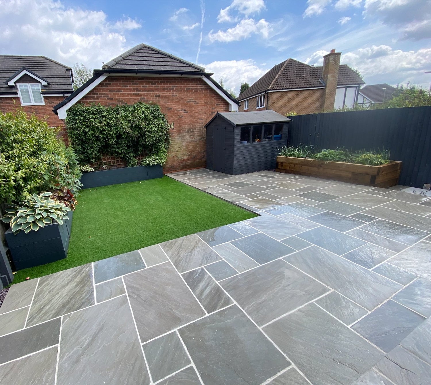 a grey sandstone paving outdoor area