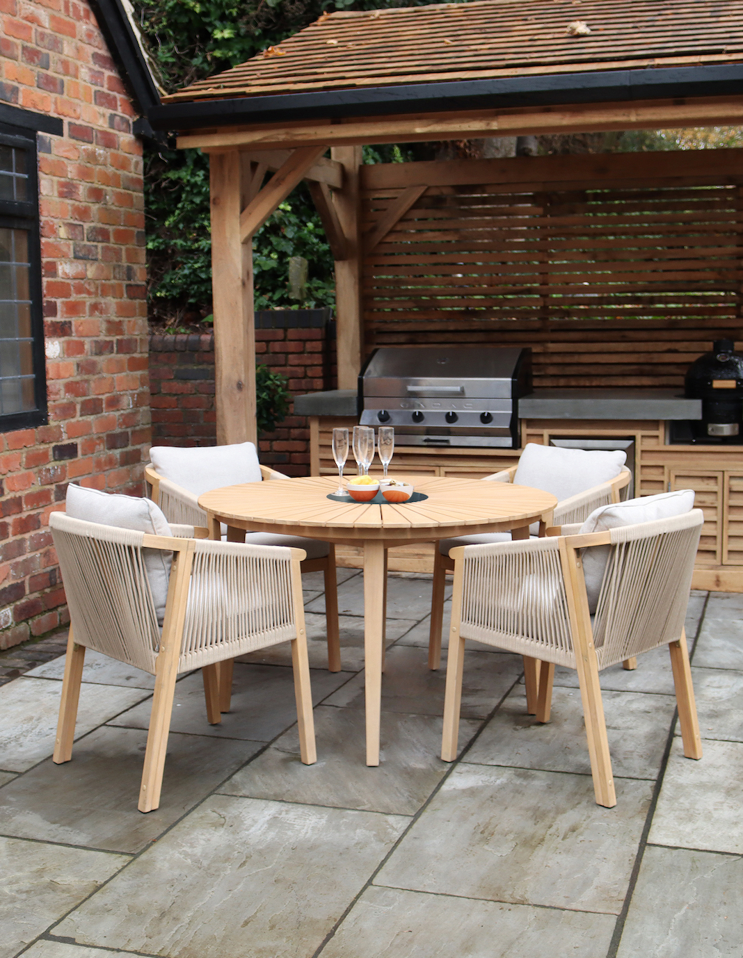 Roma 4 Seater Round Sunray with Terrazzo Insert Dining Set with Roma Rope Stacking Chairs