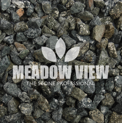 Close-up of a pile of grey and greenish Berwyn Green Chippings (14-16mm) with the logo "PAVING SHOPPER" and the text "THE STONE PROFESSIONAL" overlaid on top.