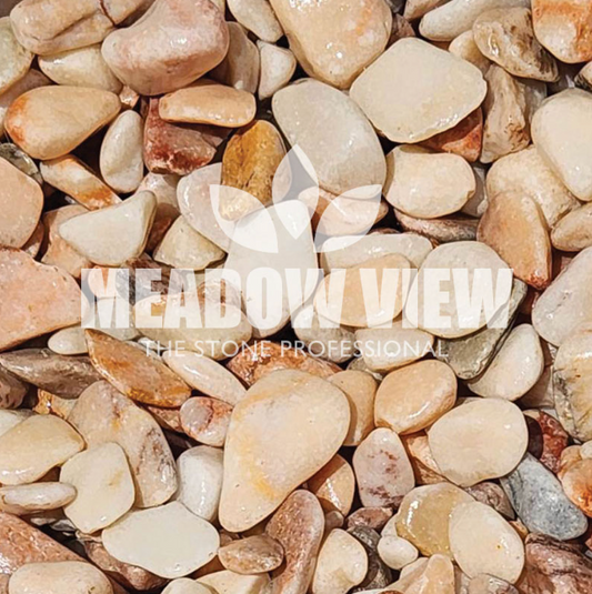 A close-up image displays a variety of smooth, light-colored Savannah Rose Pebbles (20-50mm) with the Paving Shopper logo and the text "THE STONE PROFESSIONAL" overlaying it.