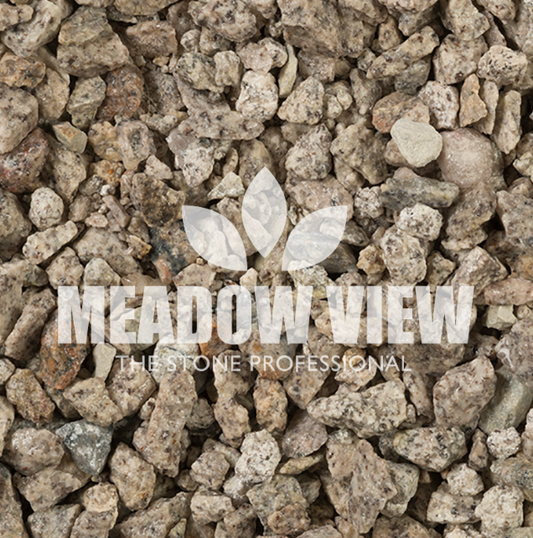 Close-up image of small, rough grey stones with the text "Silver Ice Chippings - 20mm by Paving Shopper" superimposed in white.